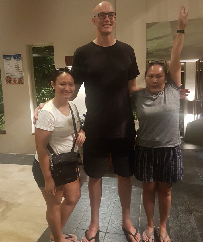 Tim, Kim & Jessica at the company's retreat back in April, one of those times, when Tim just happened to be the tallest guy